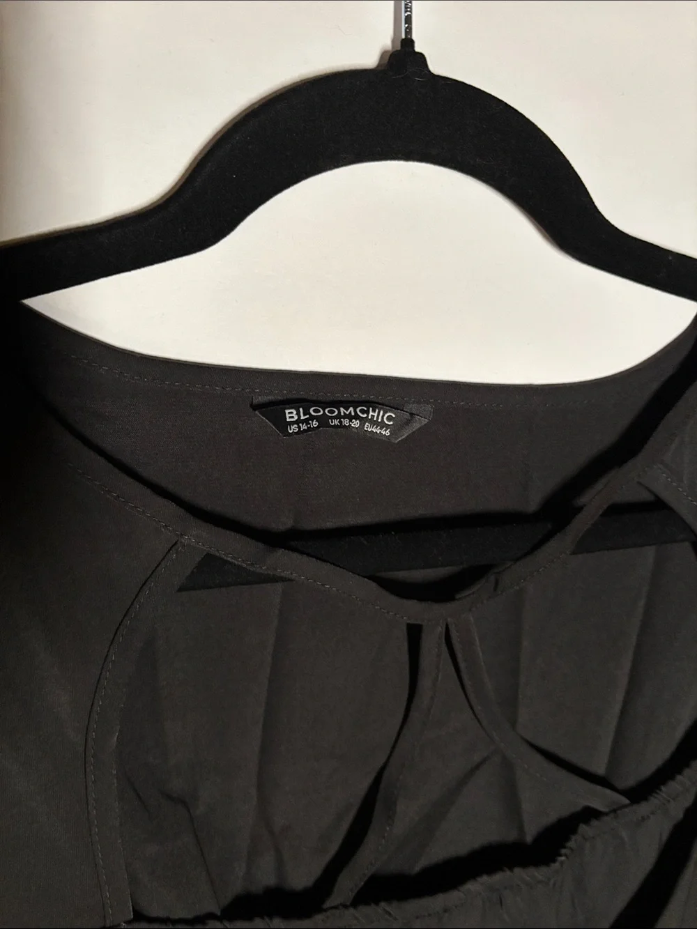 BloomChic Black Peplum Tunic with Lace Sleeves